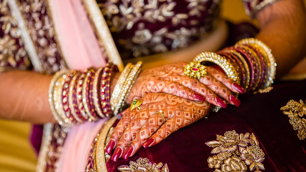 Mehndi and bangles detail, wedding Prayagraj